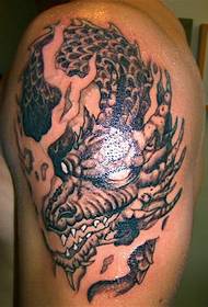 Big, super handsome dragon tattoo