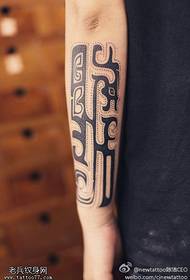 Arm mysterious totem tattoo pattern