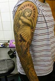 Stylish and stylish angel flower arm tattoo