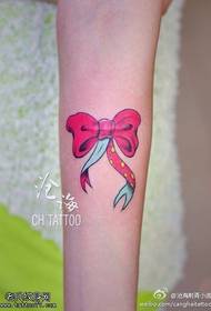 Isithombe se-arm bow tattoo