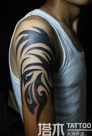 Boy arm atmosphere totem tattoo