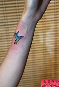 Wrist color hummingbird tattoo work