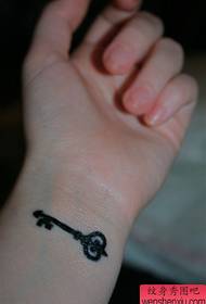 Wrist key tattoo
