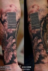 Arm and Peace Dove Tattoos are shared by tattoos