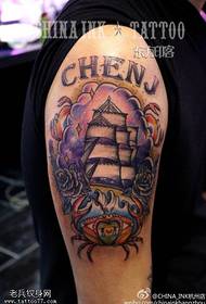 Arm color sailboat tattoos are shared by tattoos