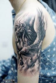 The best tattoo museum recommends an arm unicorn tattoo