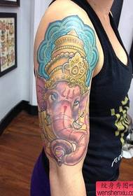 Woman arm color like god tattoo pattern