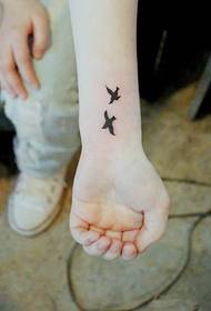 Beautiful and stylish bird tattoo pattern with arms