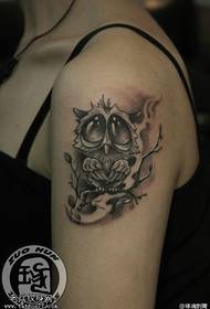 Female arm owl tattoo pattern