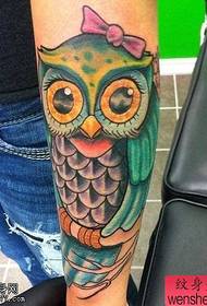 Arm color owl tattoos are shared by the tattoo show shop