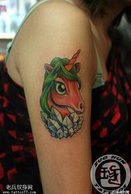 Female arm colored unicorn gemstone tattoo pattern