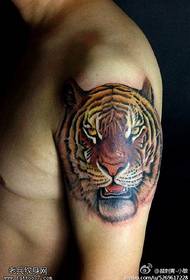 The best tattoo to share an arm tiger head tattoo