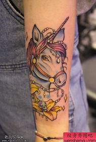 Tattoo show, recommend an arm color unicorn skull tattoo work