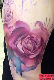 Arm colored rose tattoo tattoo
