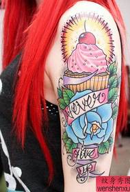 Arm color cake tattoo pattern