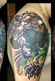 Cool classic Tang lion tattoo pattern on man arm shoulder