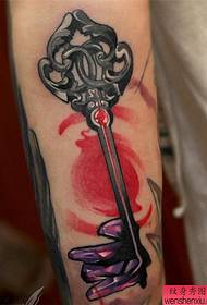 Arm key tattoo