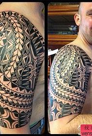 Arm tribe totem tattoo works