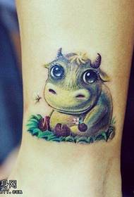 Arm cartoon cow tattoos are shared by tattoos