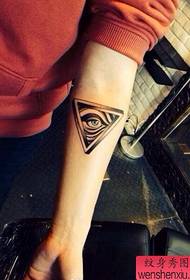 Iphethini le-Arm God eye tattoo