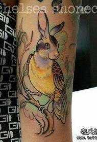 Arm color rabbit tattoo work