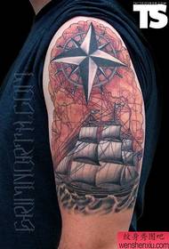 Arm creative sailboat tattoo work