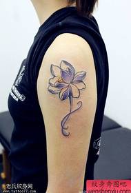 Arm color lotus tattoo work