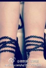 Arm beautiful and popular bead bracelet tattoo pattern