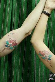 Arm cartoon floral couple tattoo