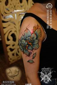 An arm colored rose tattoo pattern