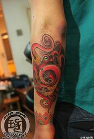Armfärg bläckfisk tatuering mönster