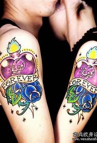 Arm couple love rose tattoo