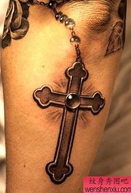 Aanbeveel vir 'n uitstekende kruis-tatoeëringpatroon