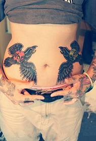personal abdomen crow skull tattoo