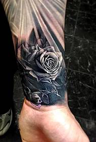 a rose tattoo on the wrist