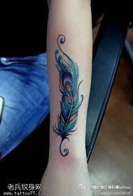 arm feather sting tattoo pattern