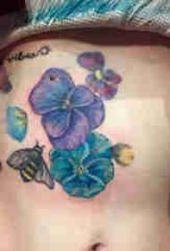 plant tattoo girl belly colored violet tattoo picture
