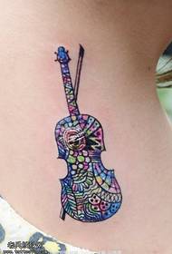 colorful spotted violin tattoo pattern