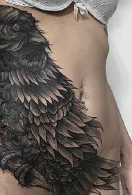 big black bird tattoo pattern of the abdomen