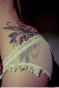 art flower hip tattoo