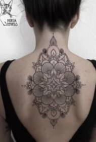 girl's back black gray point tattooed tattoo picture