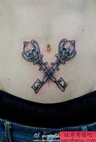 small fresh abdomen skull lock key tattoo works