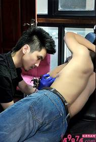Tattoo artist belly tattoo scene