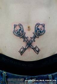 a belly fashion skull key tattoo pattern