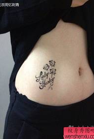 beautiful belly with delicate and simple letters and totem rose tattoo pattern