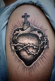 大臂欧美school心脏十字架纹身图案
