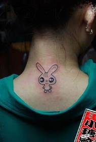 woman's back neck bunny tattoo pattern