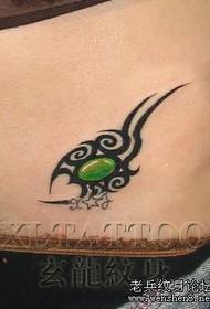 a beautiful belly totem tweezers tattoo pattern