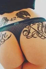 sexy buttocks in English alphabet tattoo