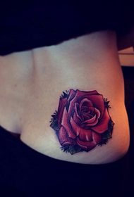 beautiful waist hips with bright rose tattoo